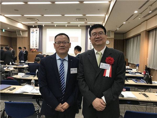 与教育部职业院校外语专业教学指导委员会副主任王志合影.jpg